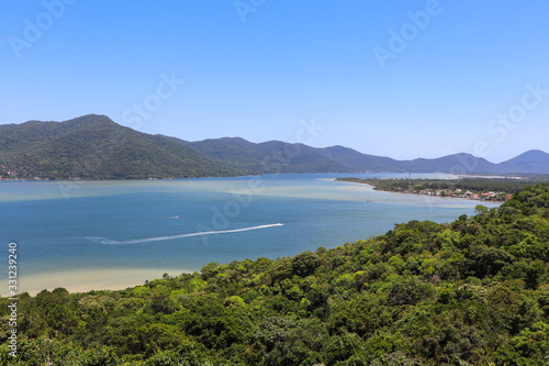 The beautiful panoramic view from the Mole beach viewpoint in Florianópolis, Santa Catarina. © marcianelsis
