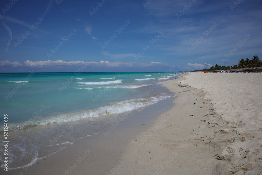 The snow- white beach of the Atlantic ocean. Cuba