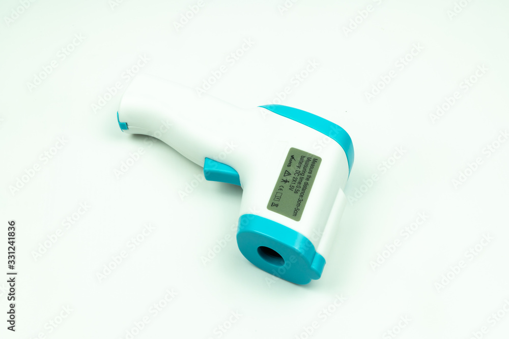 Non-contact infrared thermometer isolated on white background to measure a body temperature. Non-contact infrared thermometer isolated on white background to measure a body temperature.