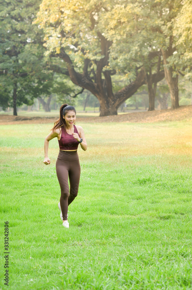 Beautiful Asian women exercise in the park every morning, It is a lifestyle for relaxation and good health of the body Beautiful Asian women exercise in the park every morning, It is a lifestyle for relaxation and good health of the body