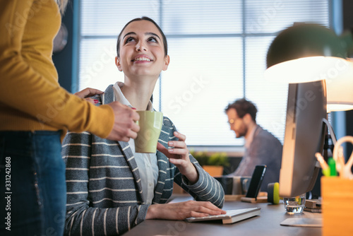 Colleagues having a coffee break together