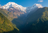 Beautiful view of Mt.Annapurna South and Mt.Hiunchuli view from Chomrong village on the way to Annapurna Base Camp, Nepal. Annapurna Base Camp Trek is one of the famous trekking routes in Nepal.