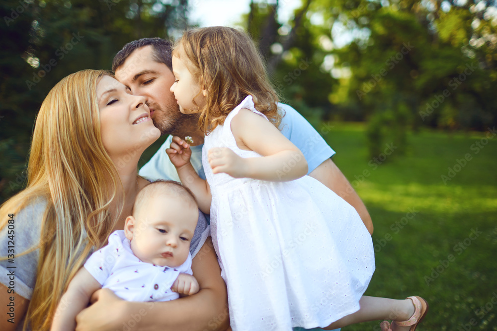 Mother father and children funny laughing outside Mother father and children funny laughing outside