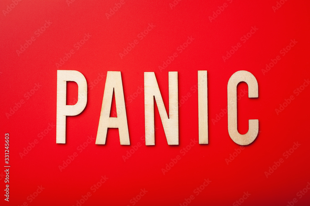 panic word text wooden letter on red background panic word text wooden letter on red background