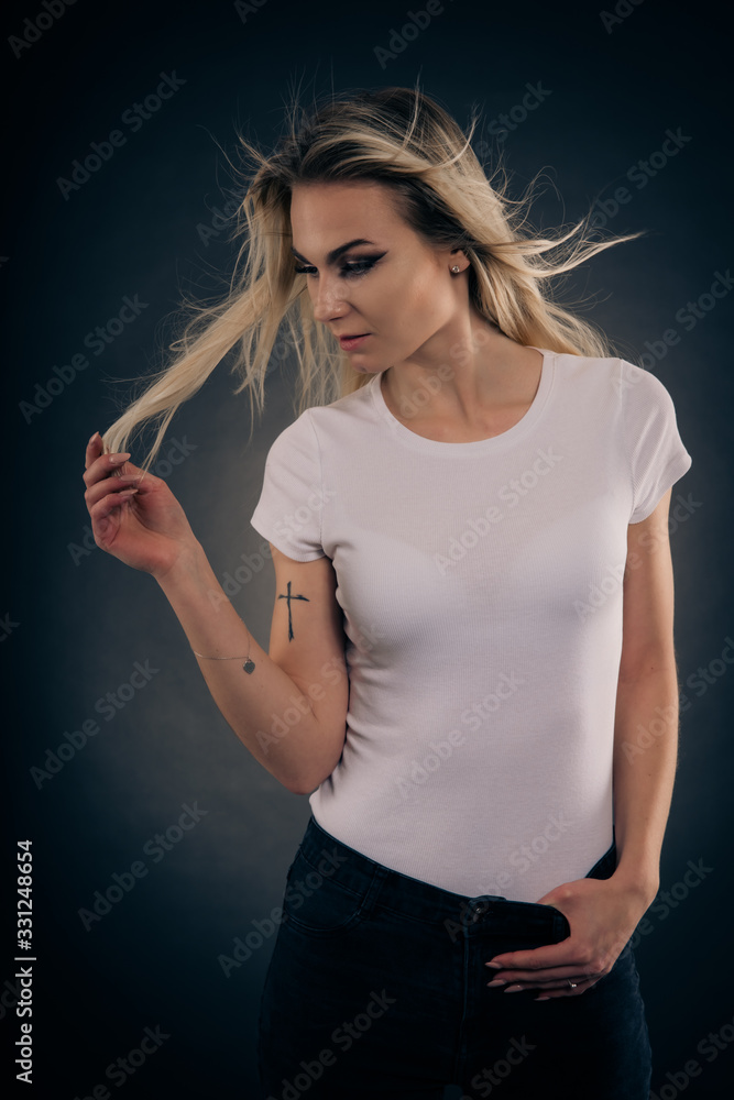 Portrait of two beautiful young women on black background Portrait of two beautiful young women on black background