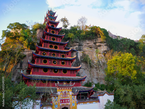 Red Shibaozhai temple embeded in the island rocks next to Yangtze River in China