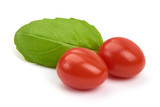 Fresh cherry tomatoes with Sweet basil leaves, isolated on white background