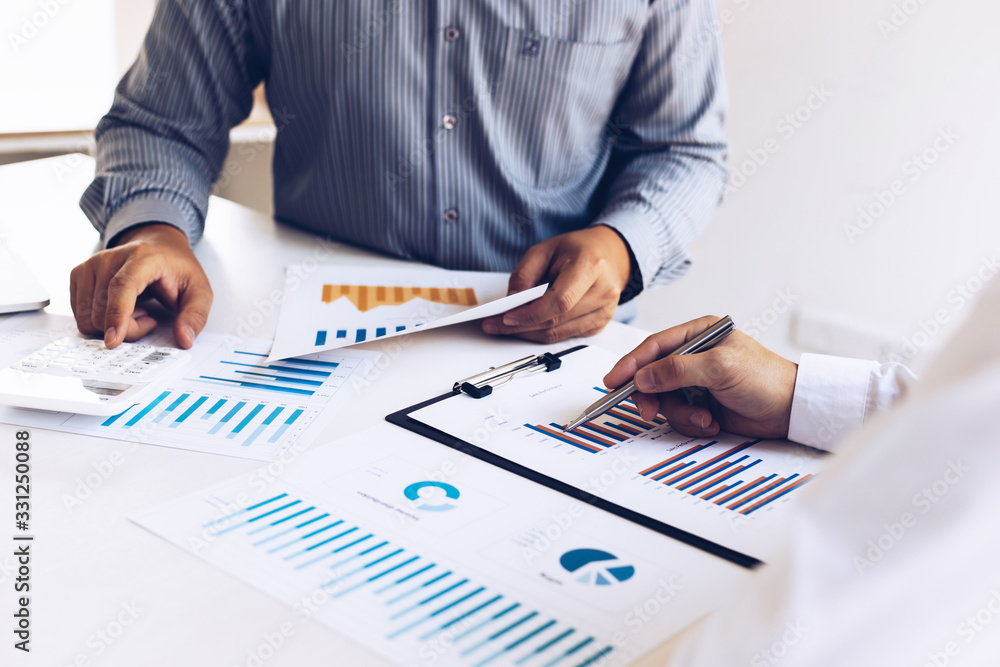 Business team meeting analyze financial graphs market growth reports And corporate income tax, Analysis of financial accounting and real estate investment concept.. Business team meeting analyze financial graphs market growth reports And corporate income tax, Analysis of financial accounting and real estate investment concept..