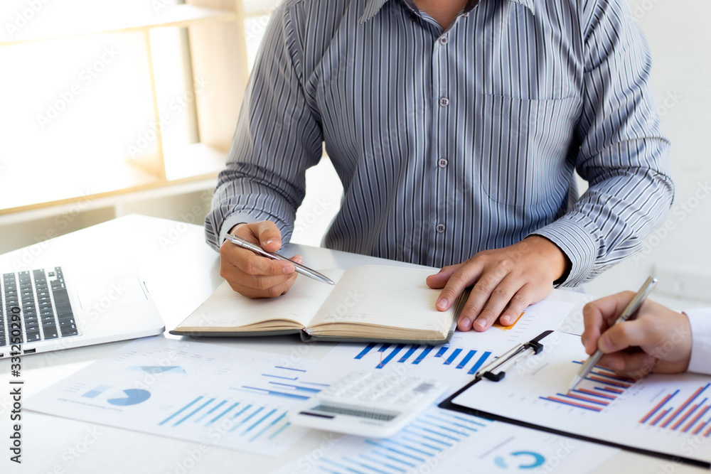 Business team meeting analyze financial graphs market growth reports And corporate income tax, Analysis of financial accounting and real estate investment concept.. Business team meeting analyze financial graphs market growth reports And corporate income tax, Analysis of financial accounting and real estate investment concept..