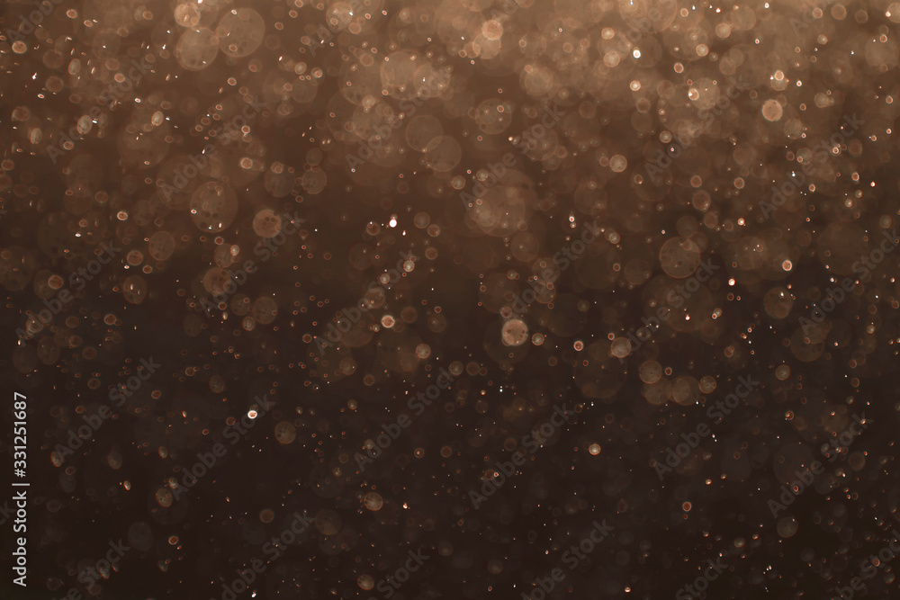 Abstract beautiful sparkling brown background.