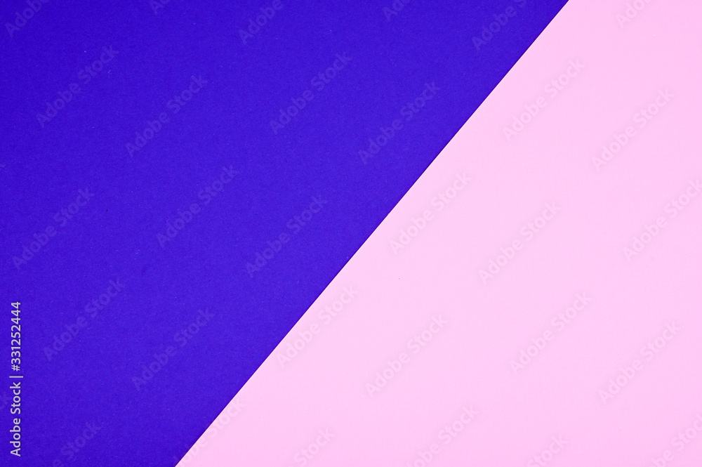 Two tone of ultramarine and pink paper background. Trend colors concept.