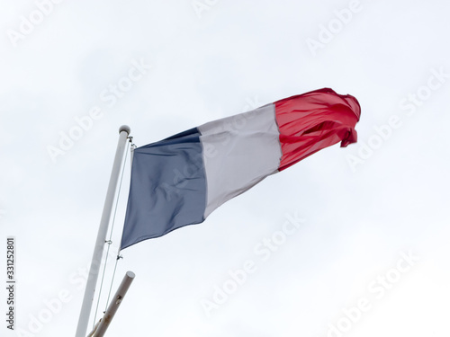 Flag of France on blue sky