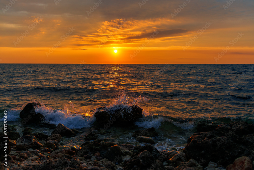 Naklejka premium sunset over the sea