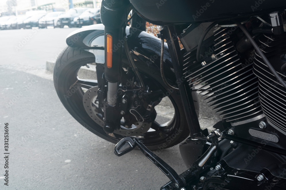 front of the motorcycle, wheel, disc brakes closeup front of the motorcycle, wheel, disc brakes closeup