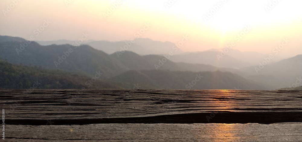 Wood floor mountains and sunlight in the morning feel fresh in Thailand