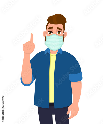Hipster young man covering face with medical mask and pointing finger up symbol. Person wearing hygienic facial protection and gesturing hand sign. Male character cartoon illustration in vector style.