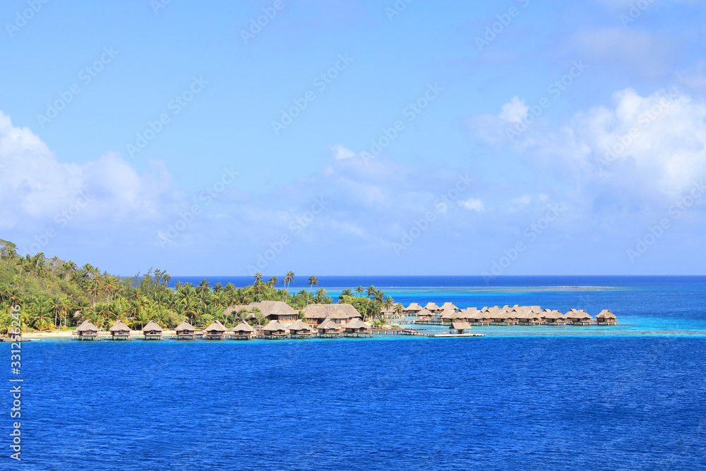 Overwater bungalows on Bora Bora island, French Polynesia