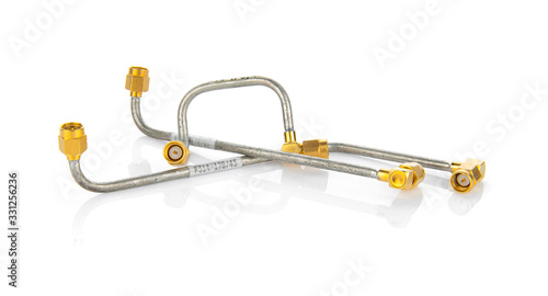 Fotografie Variety coaxial 50 Ohm RF cables with SMA connectors isolated on white backgroun