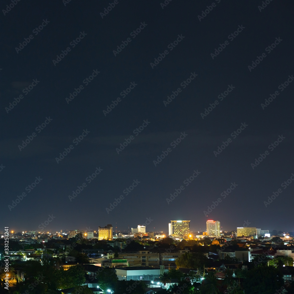 Fototapeta premium landscape city night with dramatic moody dark sky