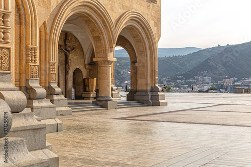 Supporting columns of the tsminda Sameba Cathedral and an observation platform on the hill of St. Elijah in Tbilisi