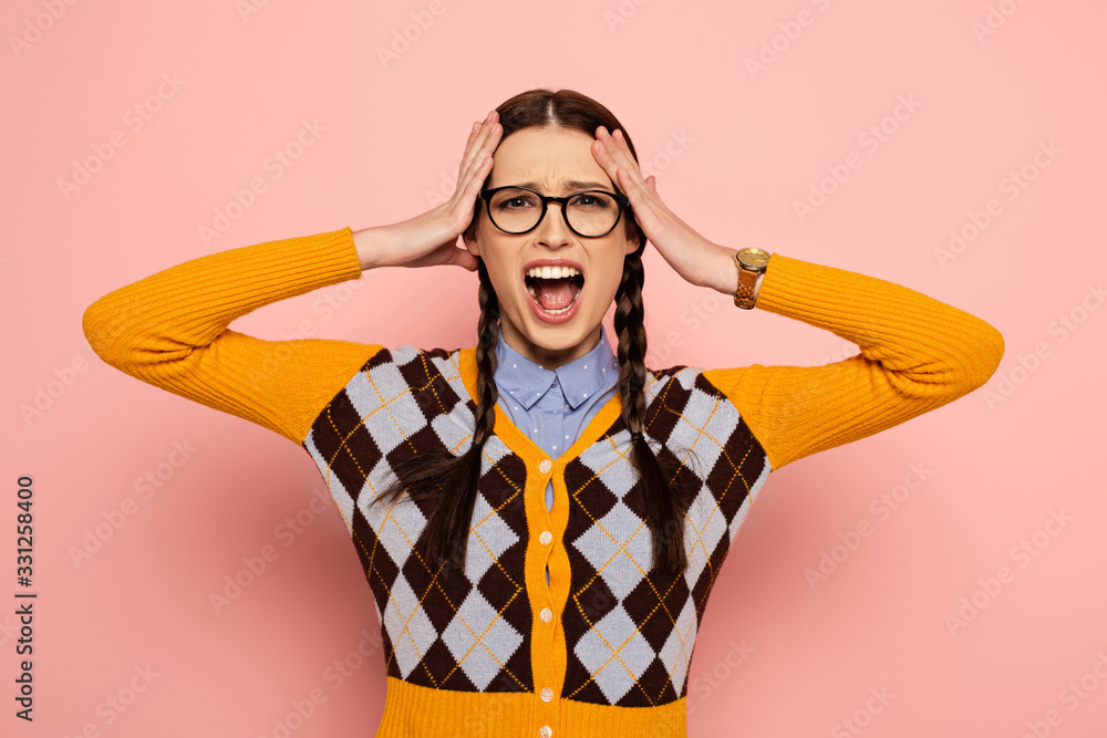 stressed yelling female nerd in glassess on pink stressed yelling female nerd in glassess on pink