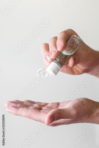 Squirting Hand Sanitizer into Hand