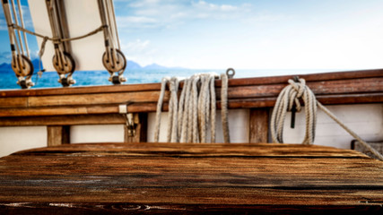 Plexiglas schilderij Schip Houten dek met zomerse zeezicht  © magdal3na