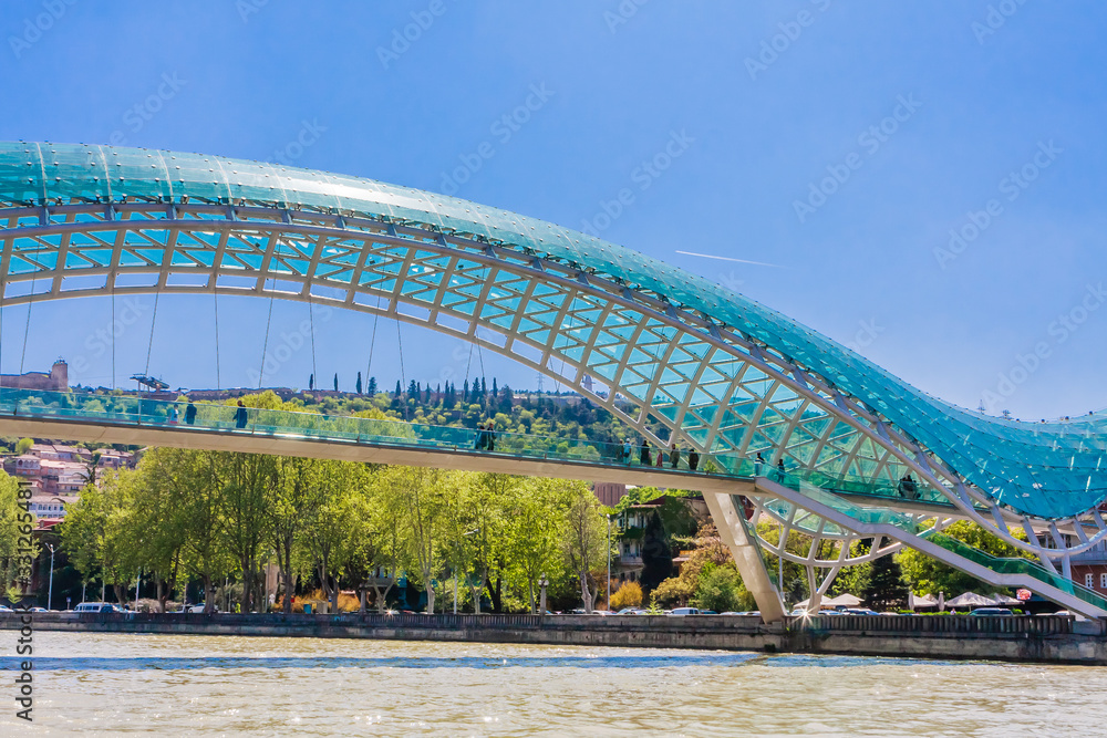 Fototapeta premium Tbilisi, Georgia. Bridge of Peace over the Kura River