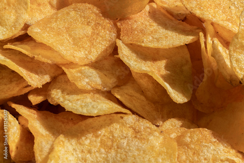 macro view of the yellow  potato chips background pattern