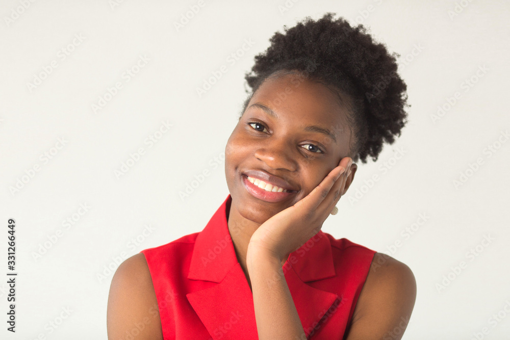 beautiful young african woman on a white background in a red suit beautiful young african woman on a white background in a red suit