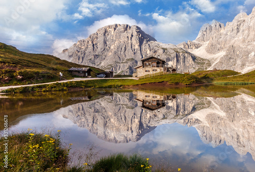 Majestic Mount with beautiful reflections in the lake. Amazing nature landscape. Wonderful Dolomites Alps.