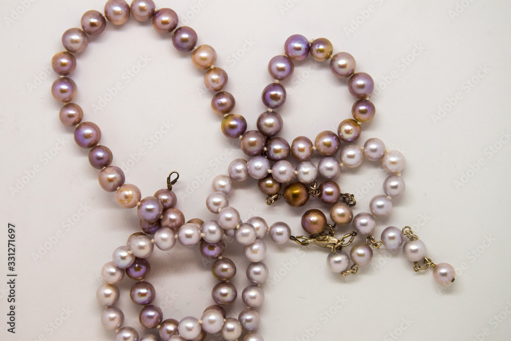 Some pearl necklaces on a white background Some pearl necklaces on a white background