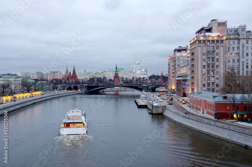 Moscow, Russia - January 10, 2020: Evening view of the Moscow Kremlin, Prechistenskaya and Bersenevskaya embankments