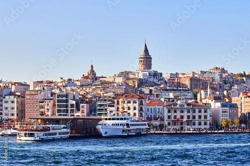 Istanbul cityscape in Turkey with Galata Kulesi Tower. Ancient Turkish famous landmark in Beyoglu district, European side of the city. Architecture of the former Constantinople © bondvit