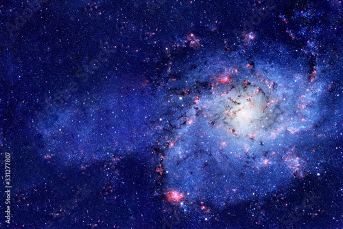A beautiful blue galaxy in deep space. Elements of this image furnished by NASA