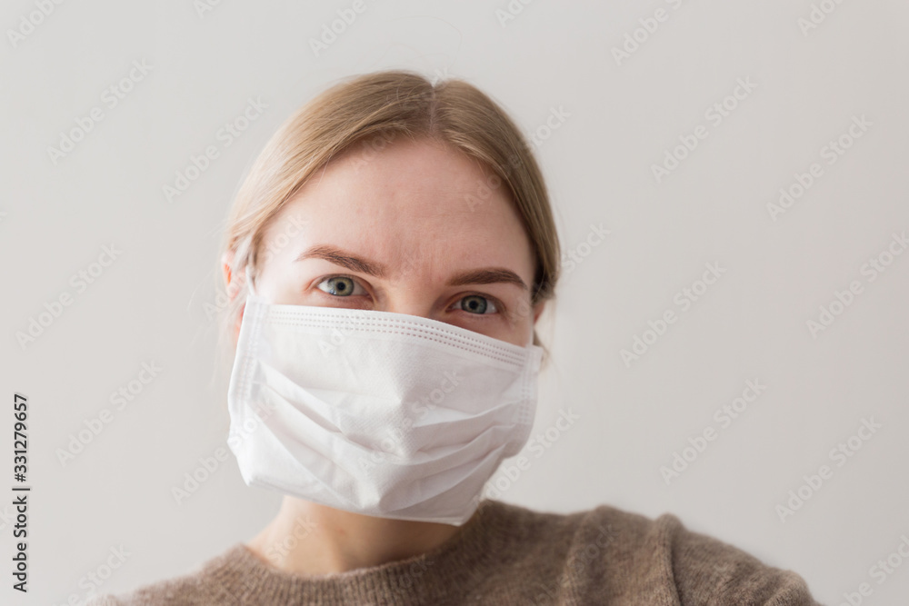 Woman with mask to protect from virus. The concept of the epidemic of the coronavirus. Stop the virus and Corona virus pandemic. Woman with mask to protect from virus. The concept of the epidemic of the coronavirus. Stop the virus and Corona virus pandemic.