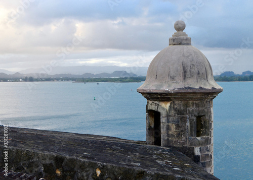 Принти на полотні A guard turret looks out over the harbor entrance in old San Juan, Puerto Rico