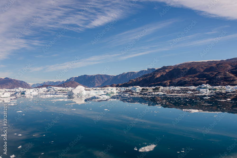 Beautiful landscape with iceberg in Greenland at summer time. Sunny weather. Beautiful landscape with iceberg in Greenland at summer time. Sunny weather.