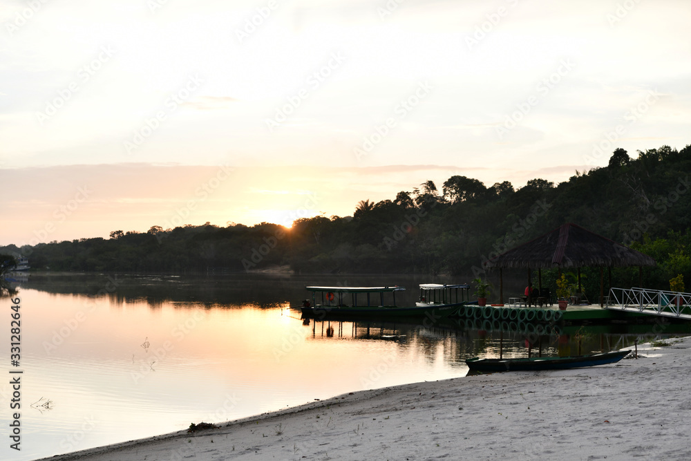 sandy beach at dawn on one of the tributaries of the Amazon in Brazil