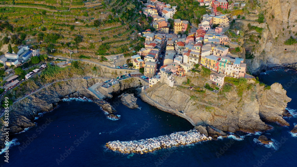 Village of Manarola in aerial view, Cinque Terre coast of Italy. Manarola is a small town in the province of La Spezia, in Liguria, in the north of Italy, magnificent seen from the Italian coast