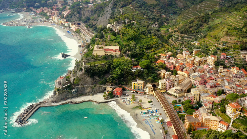 Monterosso is a village in the province of La Spezia, which is part of the Liguria region (northern Italy). It is one of the five Cinque Terre villages. aerial view with a drone and travel concept	