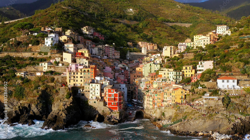 Riomaggiore Cinque Terre is a traditional and colorful fishing village of La Spezia, located on the Ligurian coast in Italy. Riomaggiore is one of the best travel villages of the Cinque Terre	