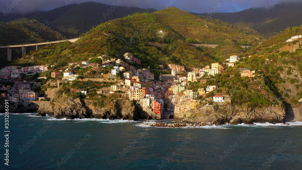 Riomaggiore Cinque Terre is a traditional and colorful fishing village of La Spezia, located on the Ligurian coast in Italy. Riomaggiore is one of the best travel villages of the Cinque Terre	
