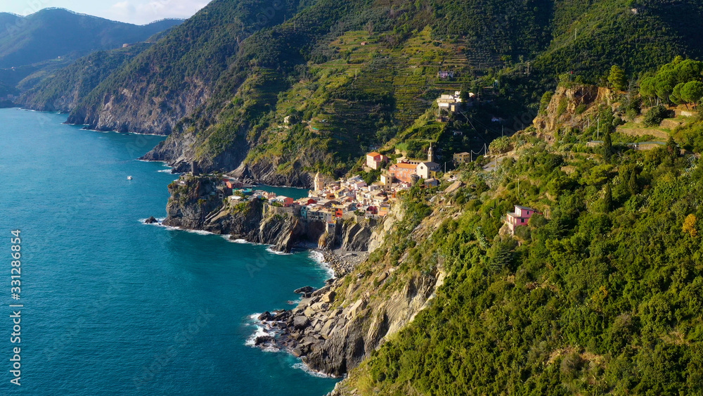 Houses on cliff in Vernazza village popular tourist destination in Cinque Terre National Park a UNESCO World Heritage Site, Vernazza, Liguria, Italy Houses on cliff in Vernazza village popular tourist destination in Cinque Terre National Park a UNESCO World Heritage Site, Vernazza, Liguria, Italy