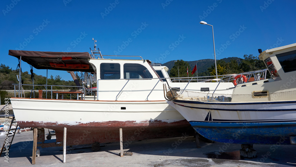 Fototapeta premium Boats at dock for repairing