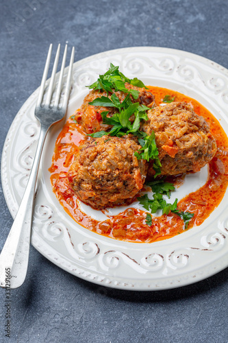 Delicious homemade meatballs in tomato sauce.