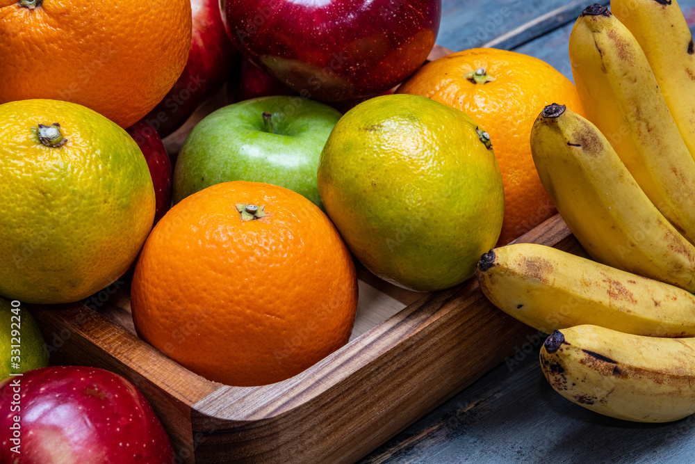 red and green apples oranges and tasty tangerines along with other fruits red and green apples oranges and tasty tangerines along with other fruits