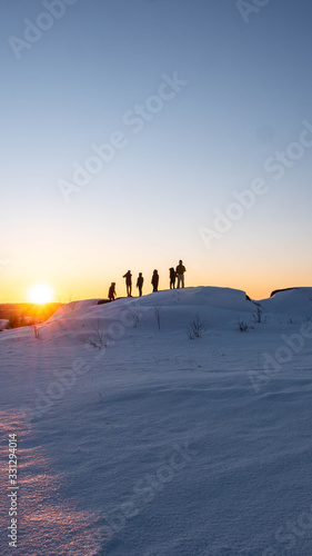 Winter sunset with friends