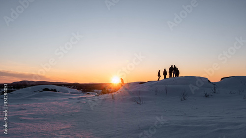 Epic snow sunset with people