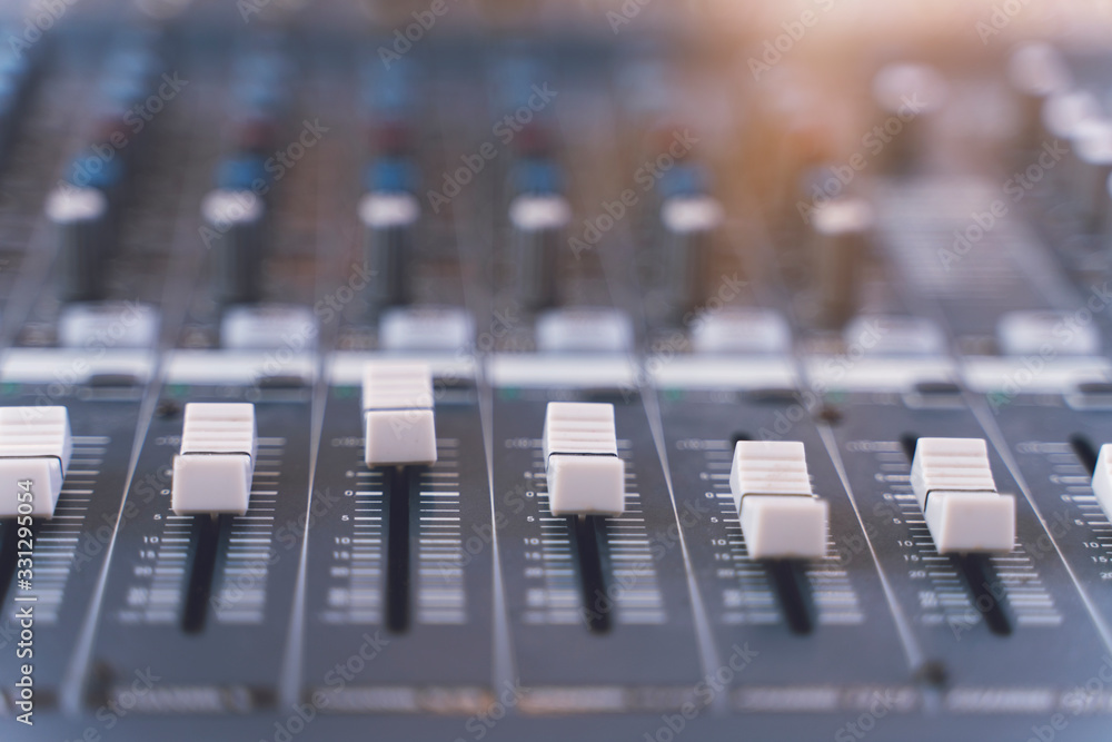 Sound mixer. Professional audio mixing console with lights, buttons, faders and sliders. Sound mixer. Professional audio mixing console with lights, buttons, faders and sliders.